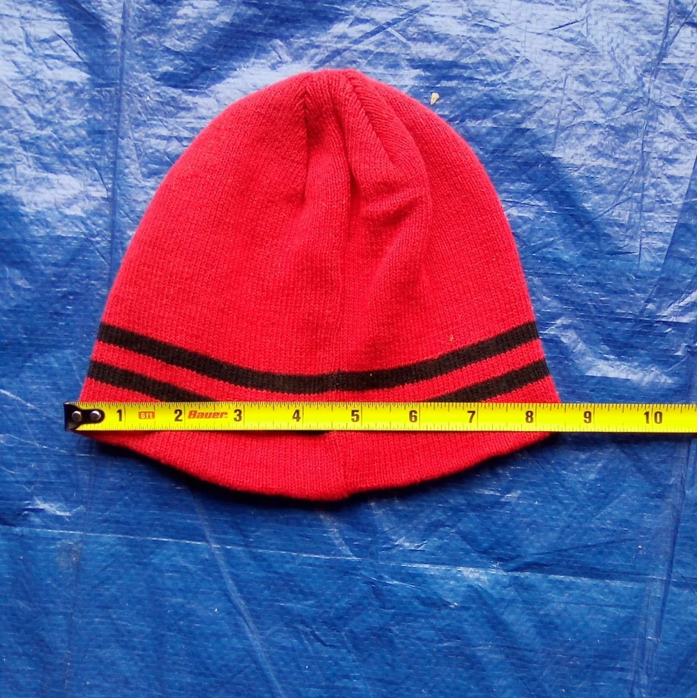 Vibrant Red Knit Hat with Black Accents
